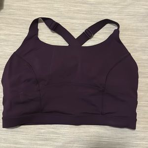 Brand new never worn Lululemon sports bra, dark purple color, Size M